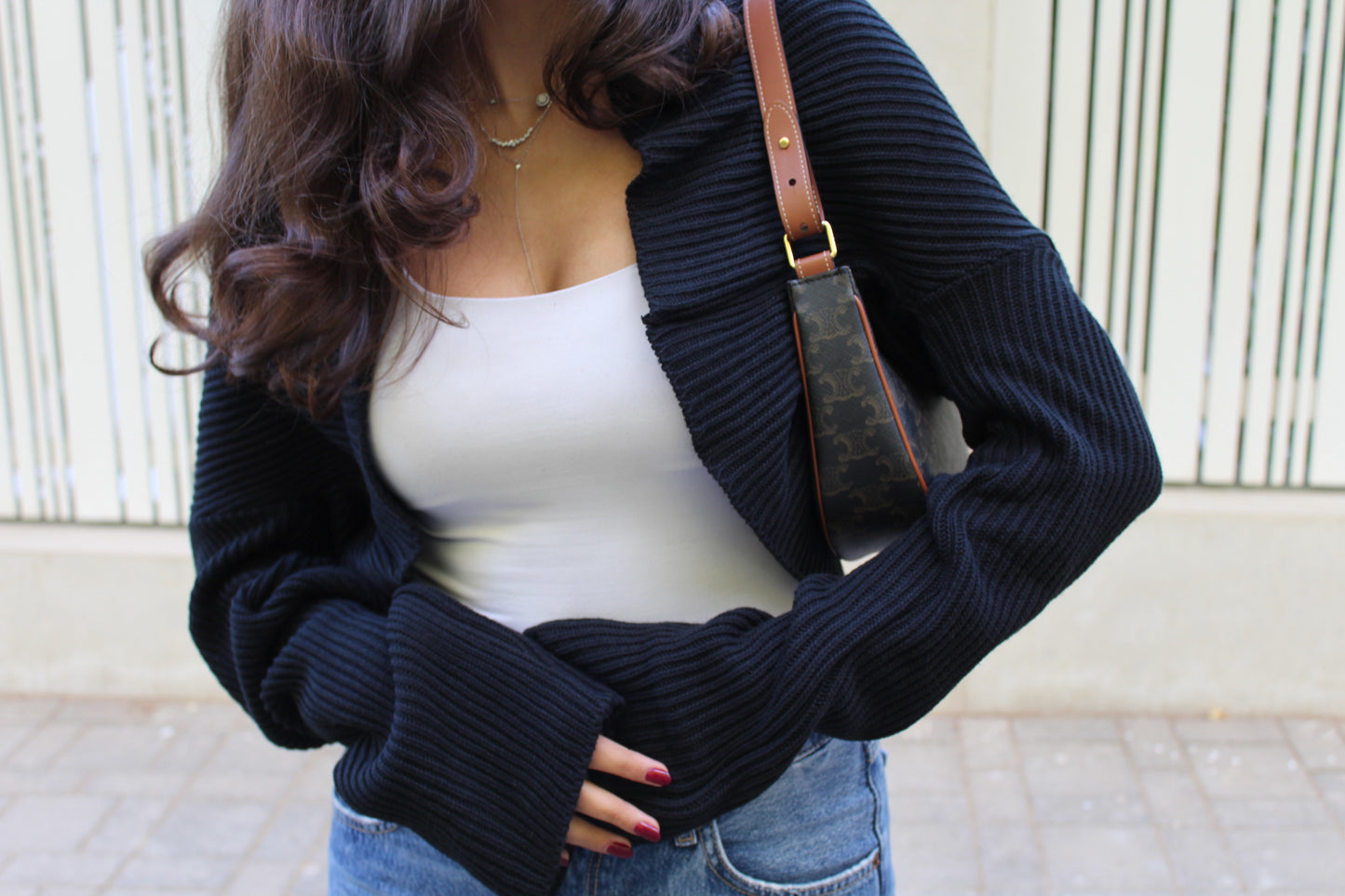 RELAXED-FIT KNIT SHRUG IN BLACK